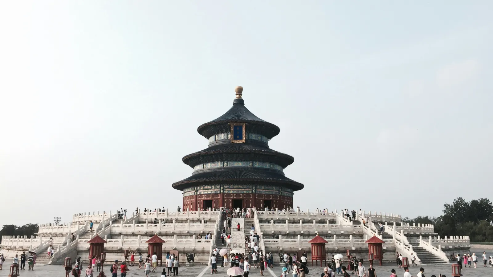 Temple of Heaven roofline against a pale Beijing sky