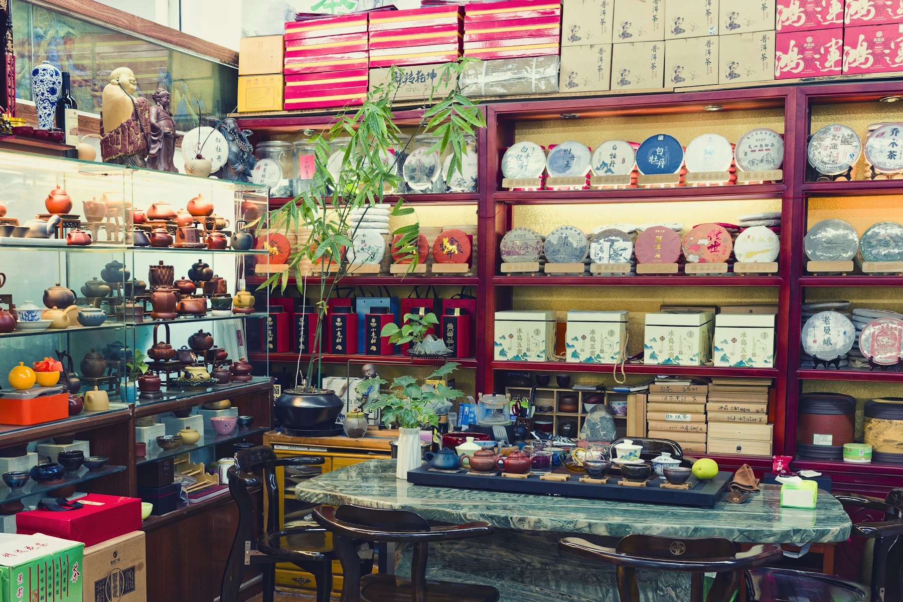 A Beijing tea shop interior filled with tea sets, objects, and quiet editorial detail